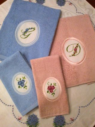 Asciugamani con lettera D e G