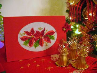 Biglietto augurale natalizio con stelle di natale