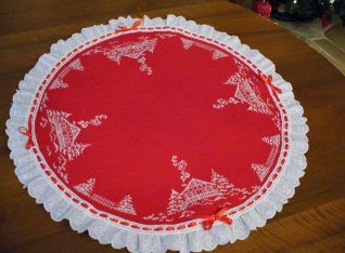 Centro rosso natalizio con casette