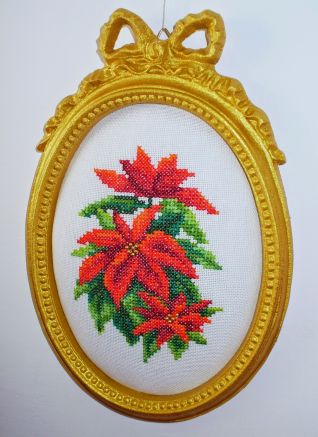 Quadretto ovale con stelle di natale