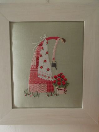 donna con innaffiatoio incorniciata