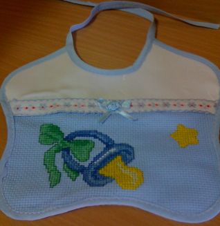 Bavaglino celeste con ciuccio