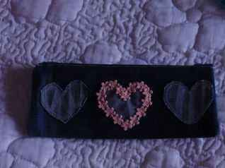 Astuccio jeans tris di cuori