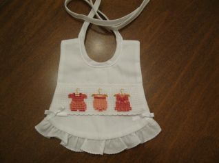 bavaglino con vestitini