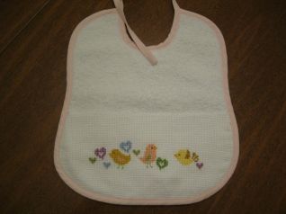 bavaglino rosa con uccellini