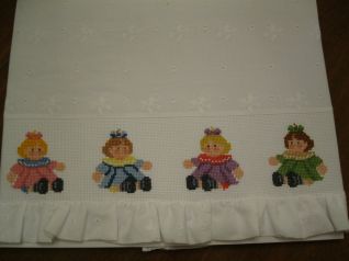 lenzuolo culla con bamboline