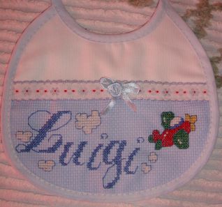 Bavaglino luigi con aeroplano