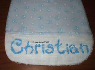 bavaglino Christian azzurro - particolare