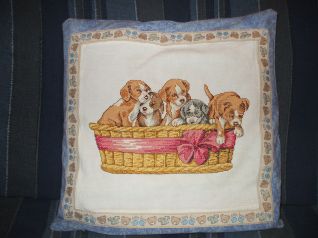 cuscino cani nella cesta