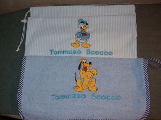 asciugamano + sacchetto