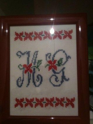 quadretto con le iniziali MG