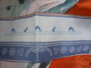 asciugapiatti con delfini