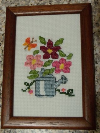 innaffiatoio con fiori