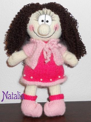 Bambola sorridente a maglia