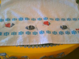 Asciugamano con schema pesci