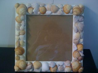 portafoto con conchiglie