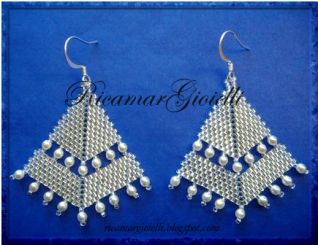 Orecchini a punta di freccia_silver lined crystal e perle avorio