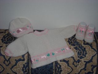 Coprifasce rosa con cappellino e scarpette