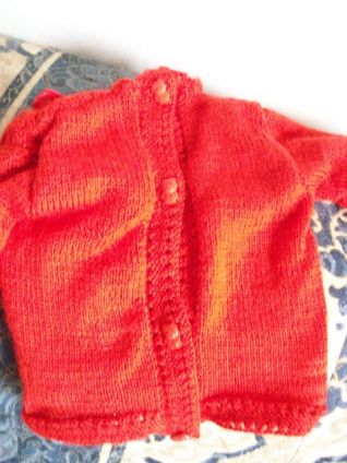 Coprifasce rosso con fiocchi con scarpine e cappellino- Particolari