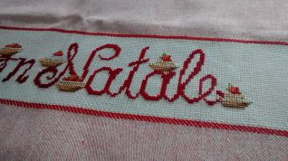 Particolare strofinaccio con dolcetti Natale