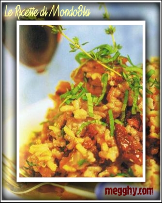 Risotto al vino rosso e alle erbe con pomodori secchi