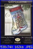 Natale: Le calze- schemi e link-dimensions-8819-christmas-sled-stocking-jpg