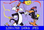Sylvester e Daffy Duck con il cappello da laureato-143048-1280x768-sylveste-daffy-duck-jpg