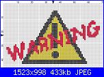 Richiesta schema: triangolo con la scritta *  WARNING*-attenzione-jpg