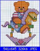 Orsetti-orsetto-su-cavallo-dondolo-%C2%A7-jpg