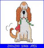 Cerco schemi 30x30-dogwithflower_200-jpg