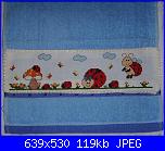 Alcuni dei miei ricami... Natalia-strofinaccio-blu-jpg