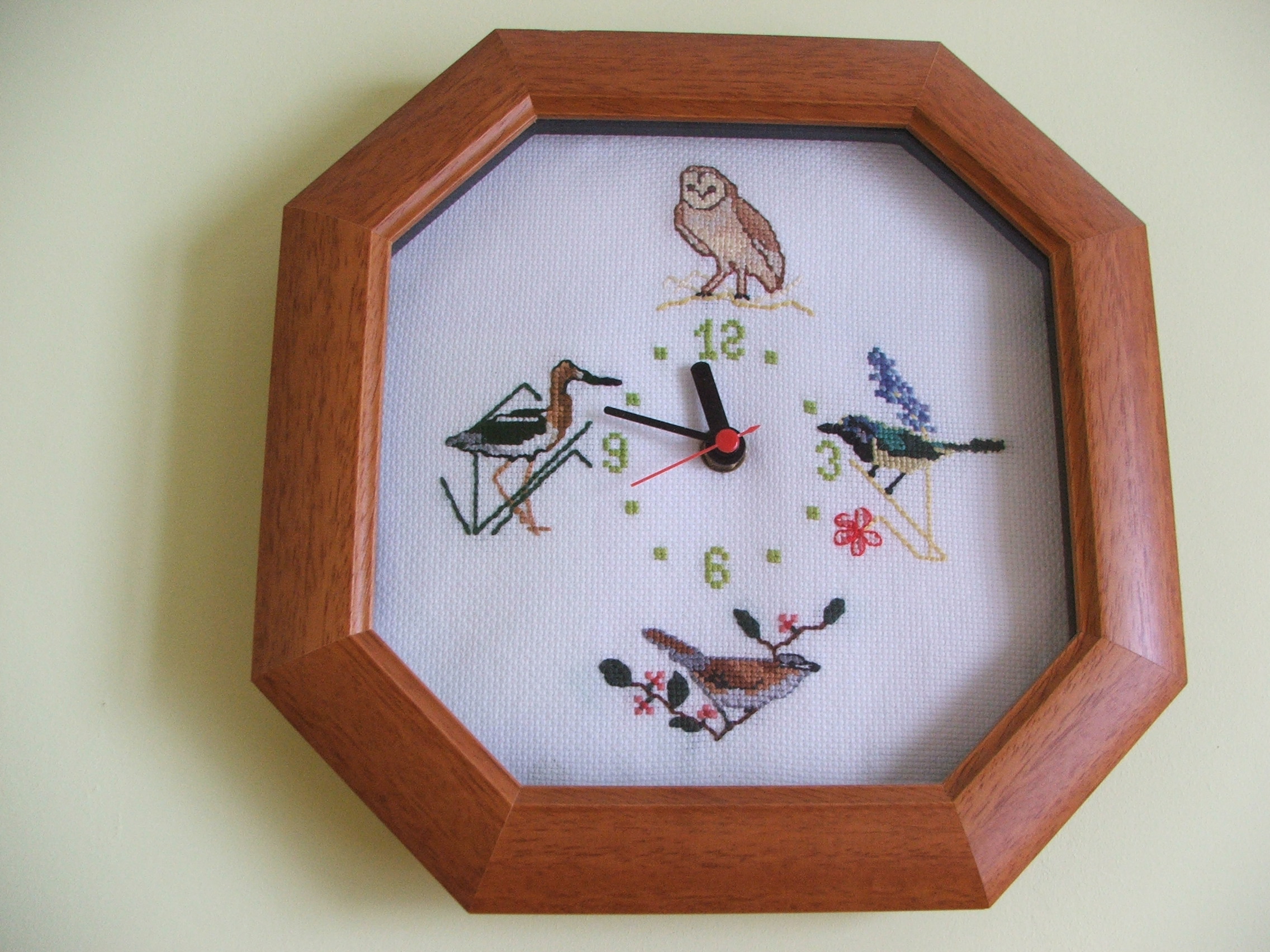 Orologio con uccelli