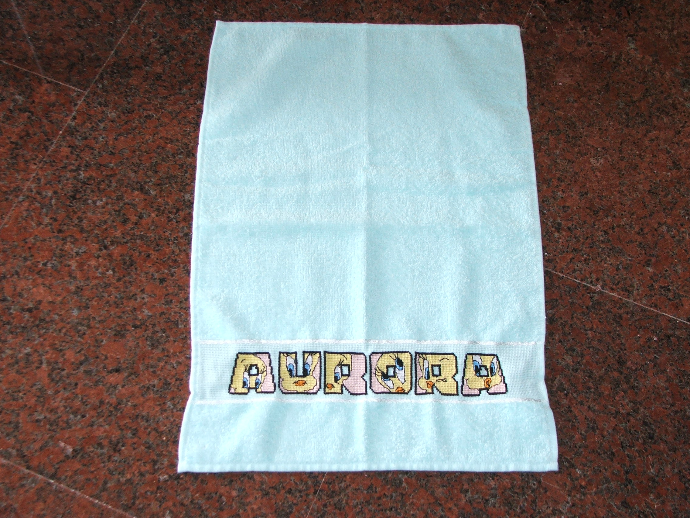 Asciugamano verde con titti