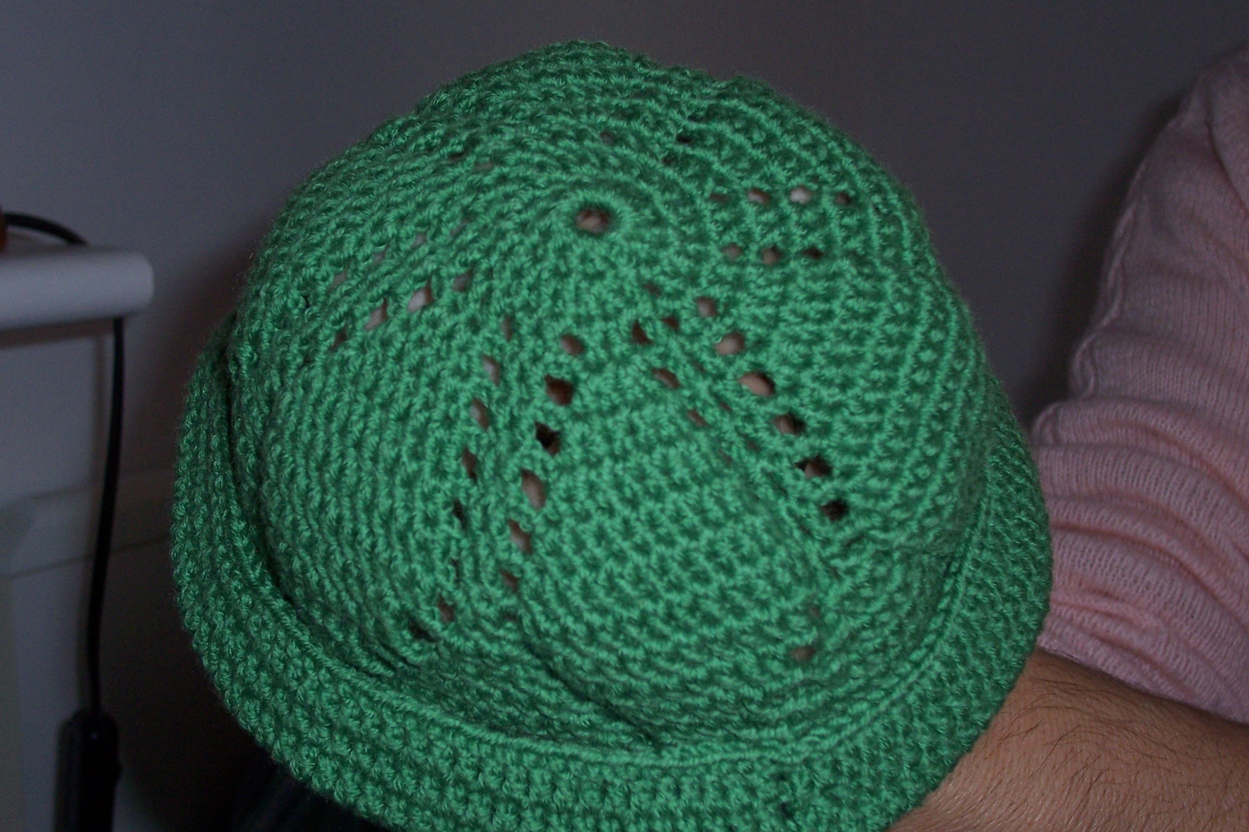 Berrettini verde con risvolto alzato