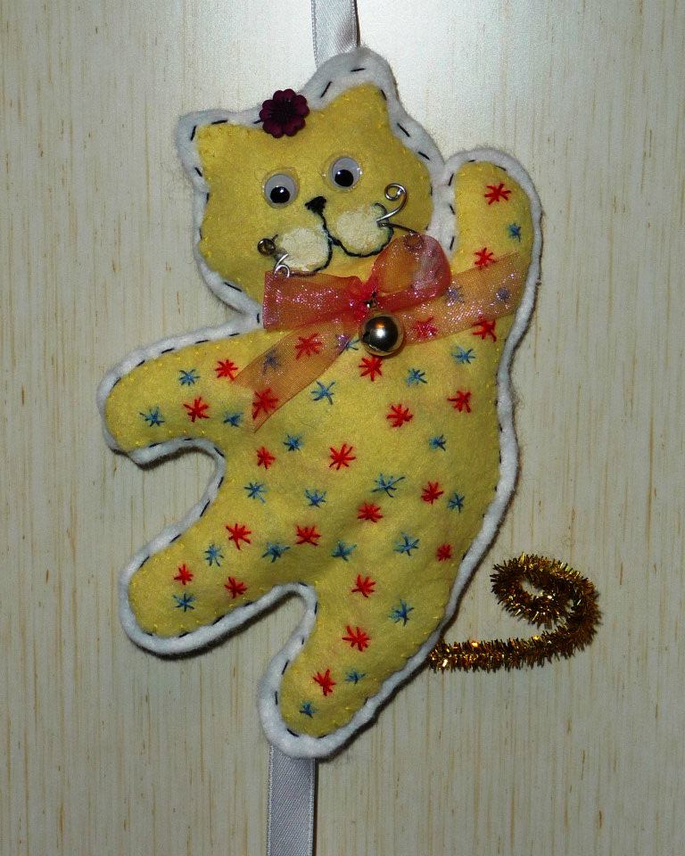 Dettaglio Gattini in feltro ricamati