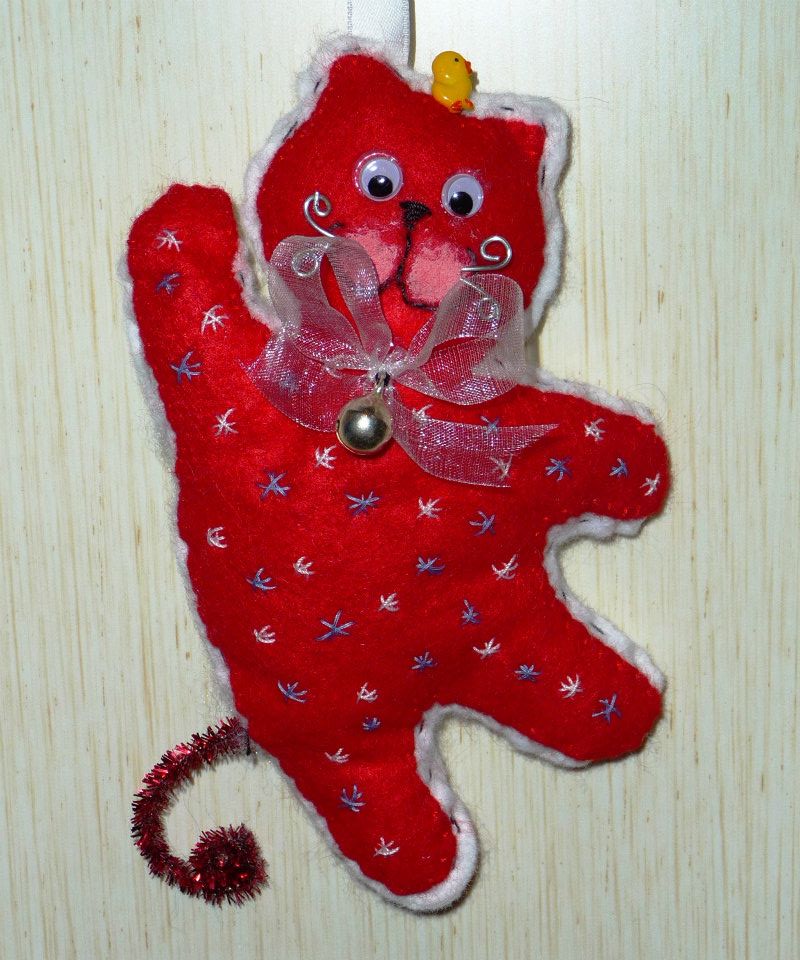 Dettaglio Gattini in feltro ricamati