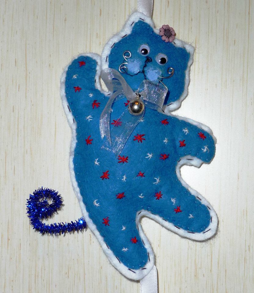 Dettaglio Gattini in feltro ricamati