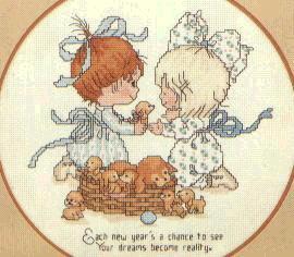 Schema punto croce Bimbi Gennaio 1