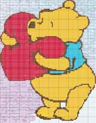 Schema punto croce Winnie abbraccia un cuore