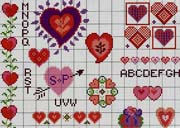 Schema punto croce motivi cuori