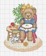 Schema punto croce orsa che ricama