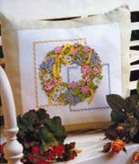 Schema punto croce Cuscino Ghirlanda Fiorita 01